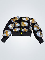 Black fuzzy jacket with blue and brown floral patt..