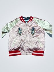 Pink bomber jacket with embroidered cranes and tig..