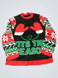 È la stagione del maglione brutto di Natale