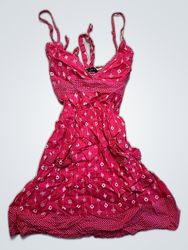 Miniabito rosa con stampa a spaghetto