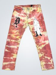 Tie-dye jeans with ghost and 'A' graphic