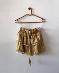 Mini gonna beige con rouches