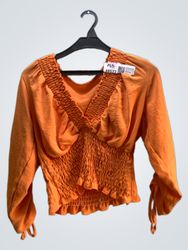 FaithVintage Orange Smocked V-Neck Long Sleeve Top