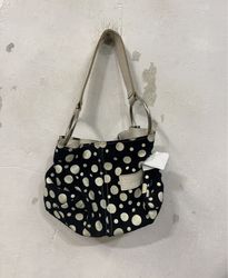 Black and white polka dot handbag