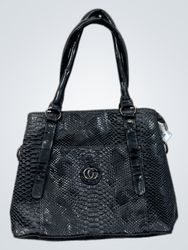Bolsa preta com relevo