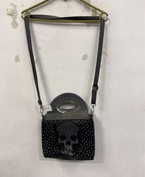 Black handbag with skull design