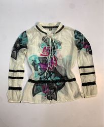 Blusa Transparente com Estampa Floral e Borda Pret..