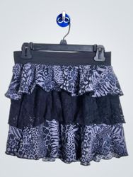 Mini falda con volantes en capas y estampado anima..