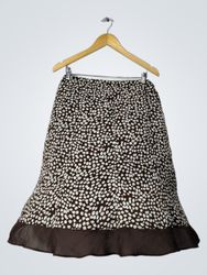 Jupe marron avec des pois blancs