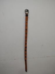 Brown leather belt with silver buckle and decorati..