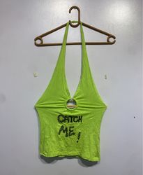 Green halter top with "CATCH ME!"
