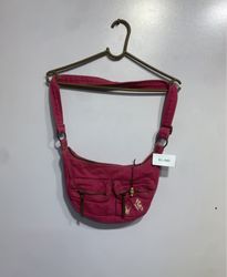 Pink hobo bag with butterfly embroidery