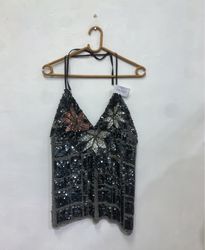 Black sequined camisole with floral and grid patte..