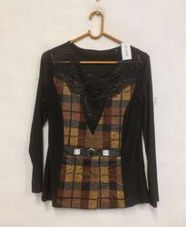 Black long-sleeve top with plaid and buckle detail