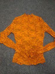 Haut en dentelle orange à manches longues