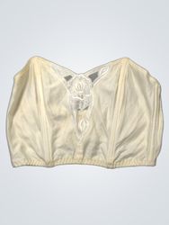 Corsetto bianco con dettaglio floreale