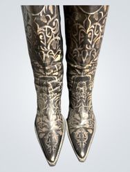 Black cowboy boots with ornate silver detailing