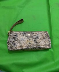 Snakeskin clutch with gold embellishments