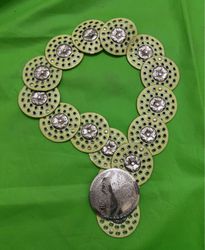 Belt with decorative medallions and buckle