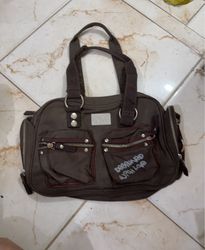 CATWALK handbag with "DESIGNED WITH LOVE" text