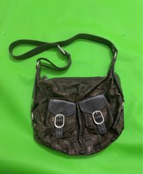 Brown dp patterned shoulder bag with two front poc..