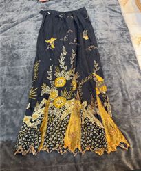 Black and yellow patterned skirt