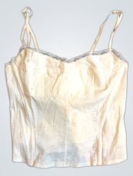 Top corsetto in sangallo bianco con bordo in pizzo..