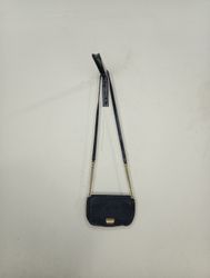 Black shoulder bag with gold chain and clasp