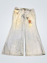 Jeans évasés à taille haute en denim clair avec de..