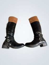 Black and brown knee-high boots