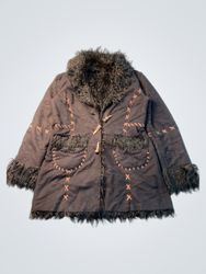 Black coat with faux fur trim and decorative stitc..