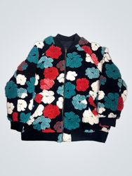 Black bomber jacket with colorful floral pattern