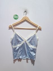 Blue satin camisole with white lace trim