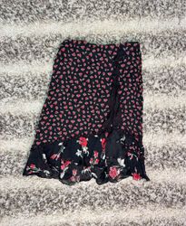 Black floral print skirt with ruffle detail