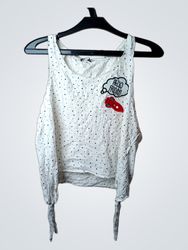 White polka dot tank top with "Hello Friday!" patc..