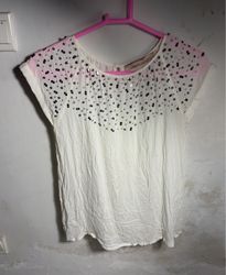 White T-shirt with beaded embellishments