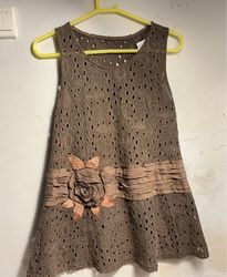 Brown sleeveless dress with floral embellishment