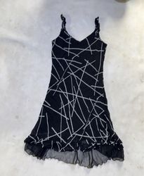 Black dress with white abstract lines and ruffled ..
