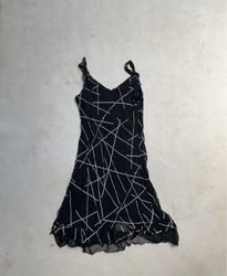Black dress with white line pattern