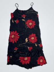 Black dress with red floral print and ruffled hem