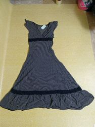 Black and white polka dot dress with ruffle trim