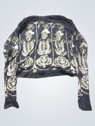 Black long sleeve crop top with white and green fl..