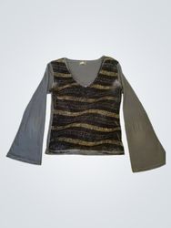 Black long sleeve v-neck top with gold wave patter..