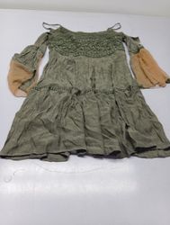 Green tiered dress with sheer bell sleeves