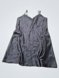 Black satin slip dress with lace trim