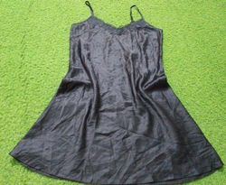 Black satin slip dress with lace trim