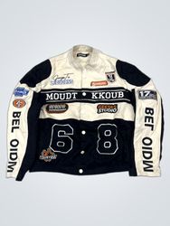 MISSYEMPIRE Jacket with "MOUDT KKOVB" and "6 8" gr..