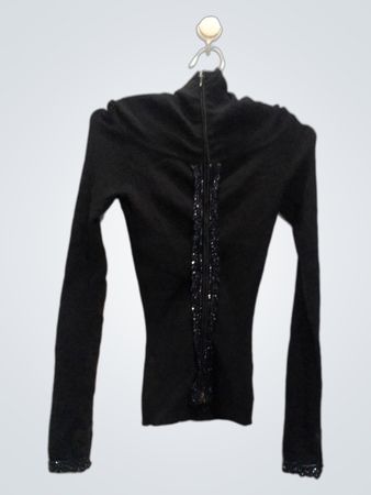 Top nero a maniche lunghe con cerniera e dettaglio di paillettes