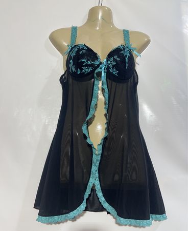 Schwarzes durchsichtiges Babydoll mit blauem Besatz