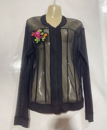 Bomber in rete nera trasparente con applicazioni floreali
